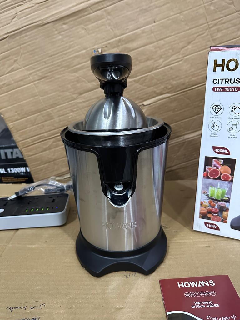 LOT IMPORTED HOWANS CITRUS JUICER